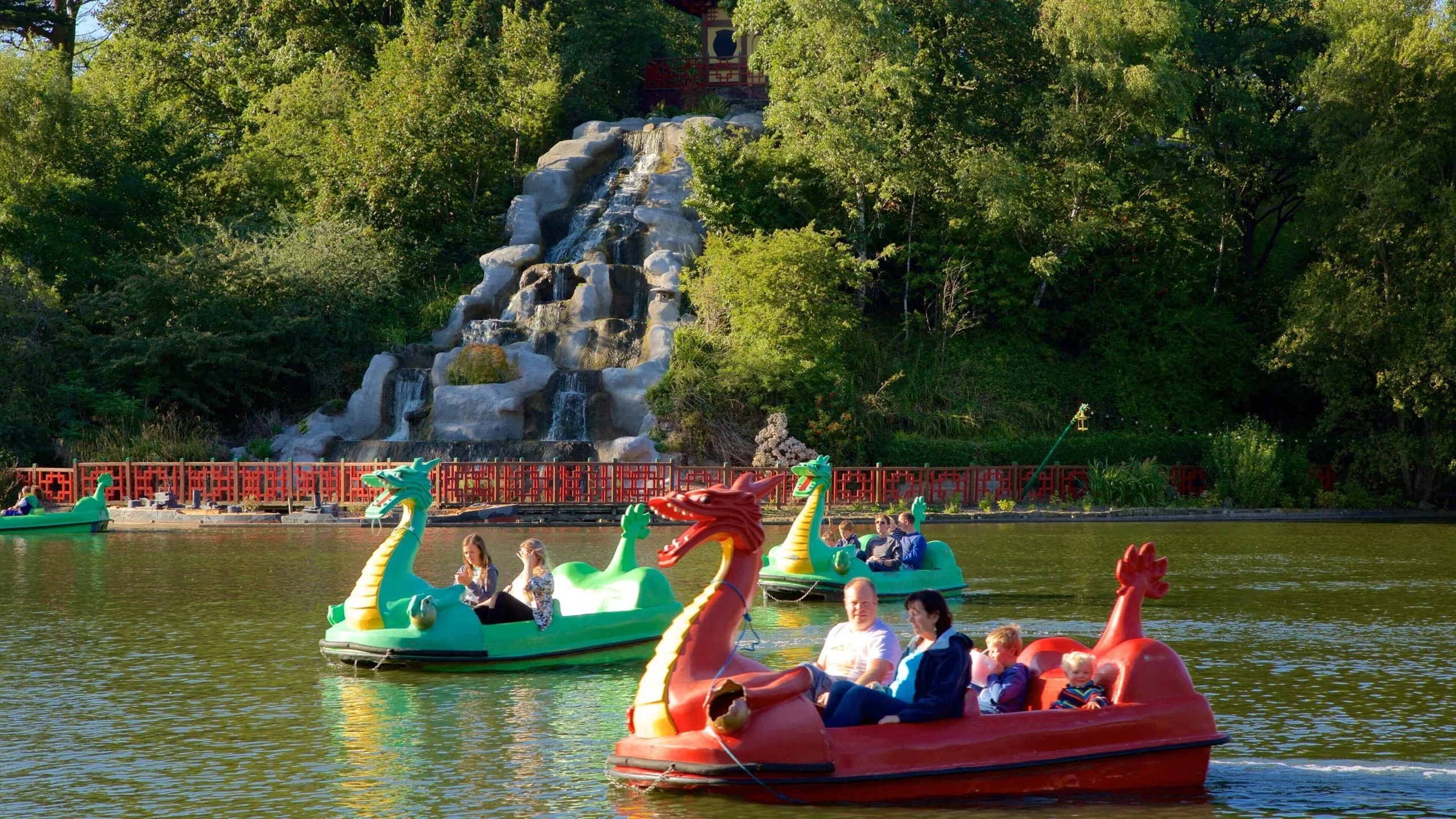 Dragon-shaped pedalo boats on the lake at Peasholm Park in Scarborough