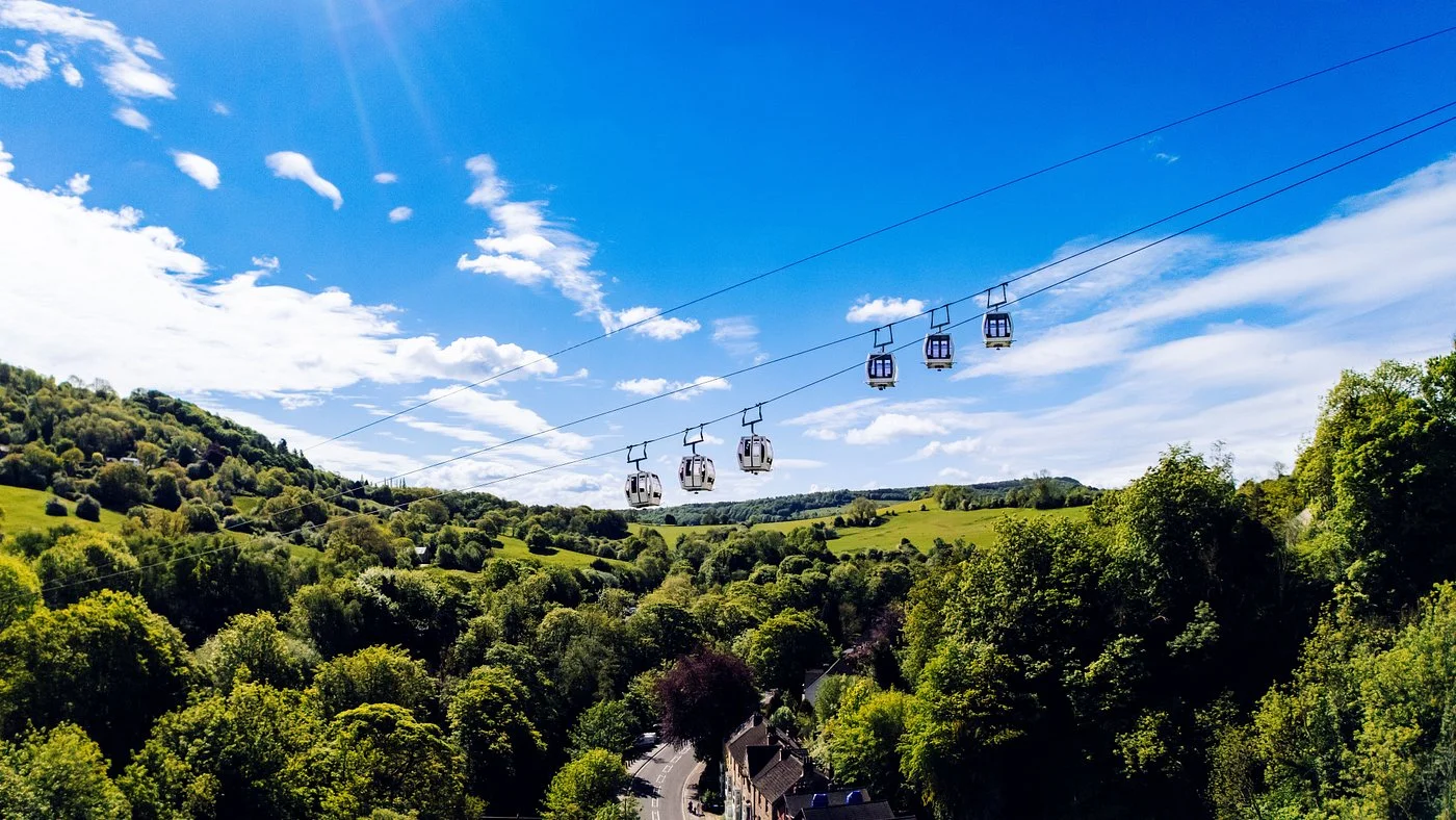 Cable cars at the Heights of Abraham rising over the Derwent Valley above Matlock Bath in the Peak District