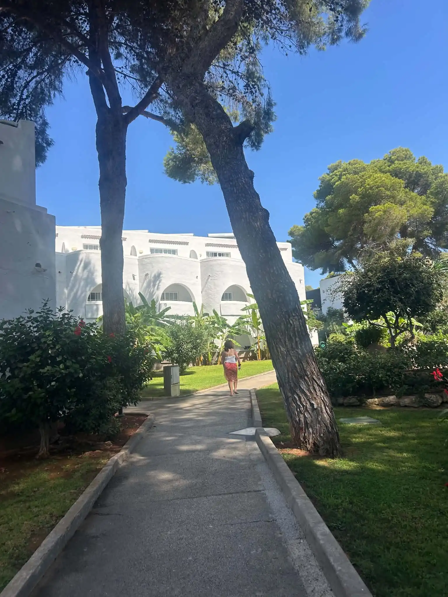 Garden path leading to the apartment blocks at TUI Magic Life Cala Pada
