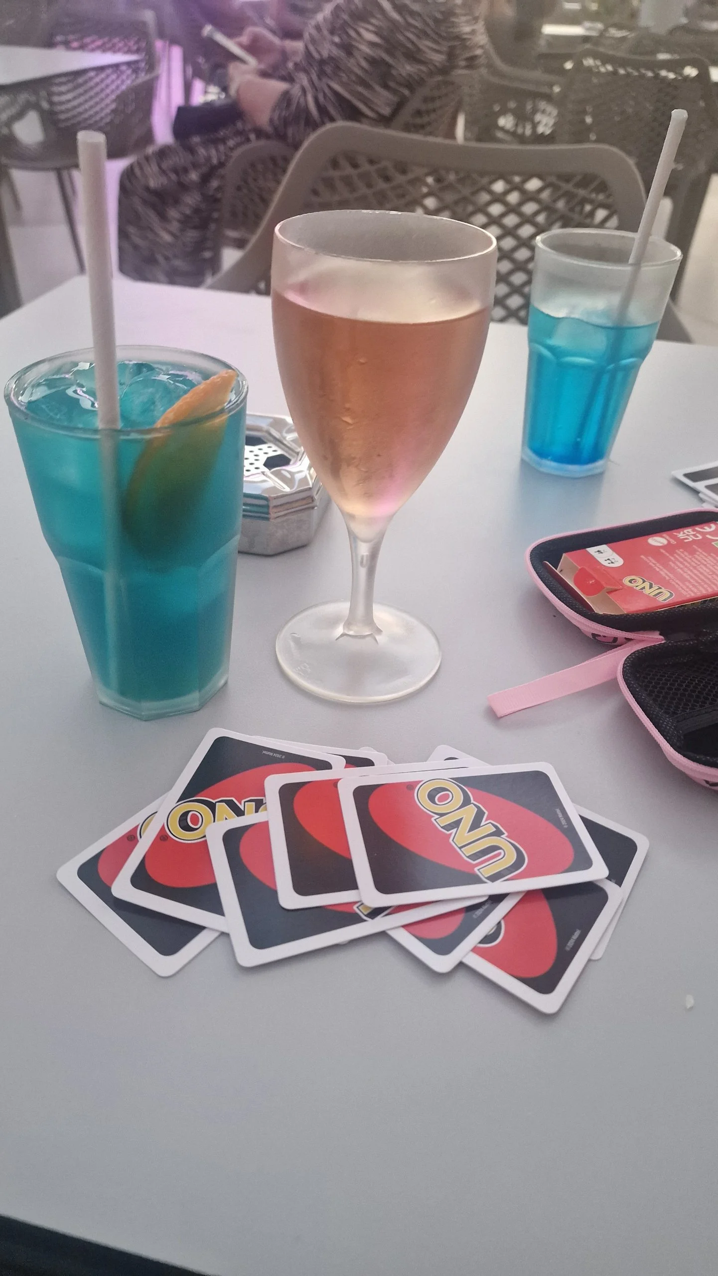 Table with uno cards and kids mocktails